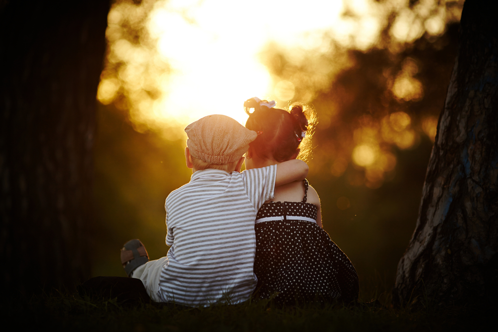 Boy and Girl at sunset