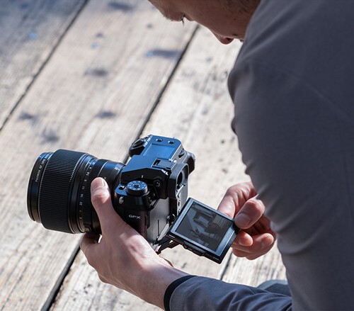 man using a Fujifilm GFX 100S
