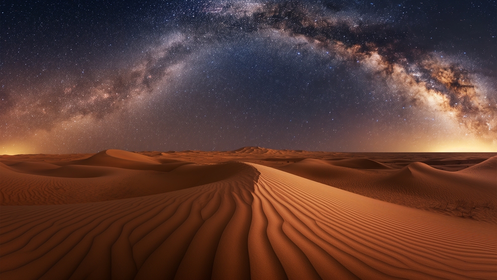 night sky over a sand dune