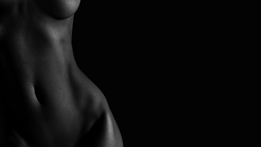 Nude woman's torso