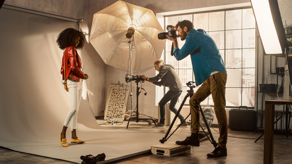 Photographer and model in the studio