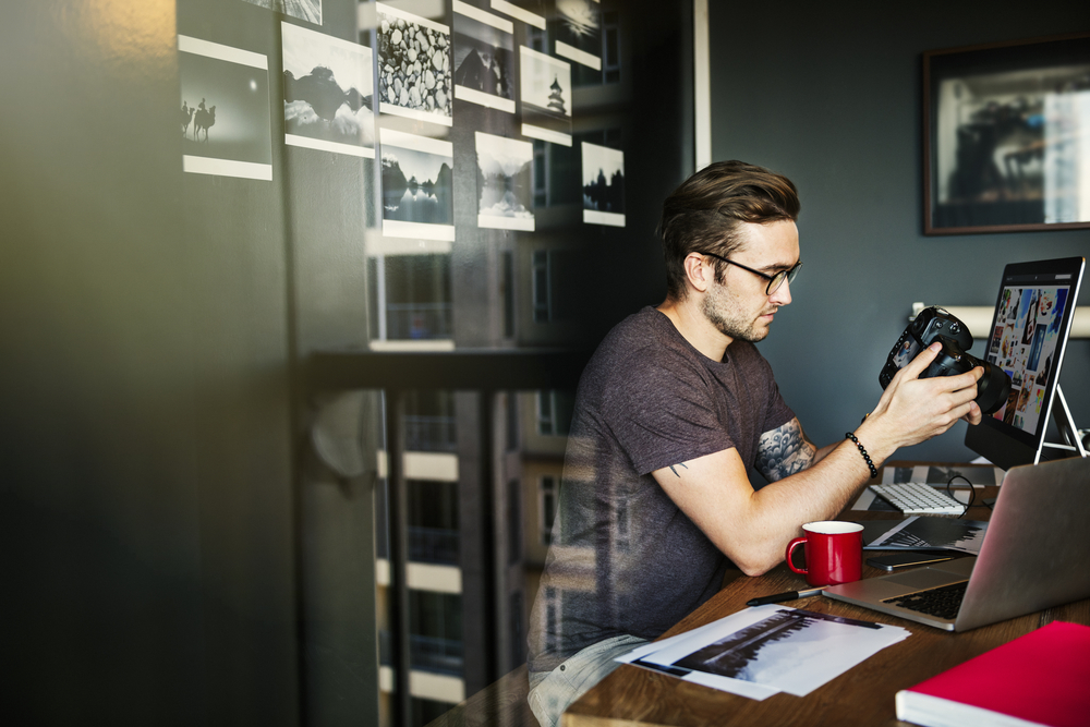 Photographer at his desk