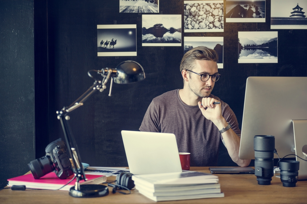 photographer editing photos on a computer