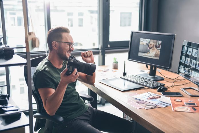 Photographer working at his desk