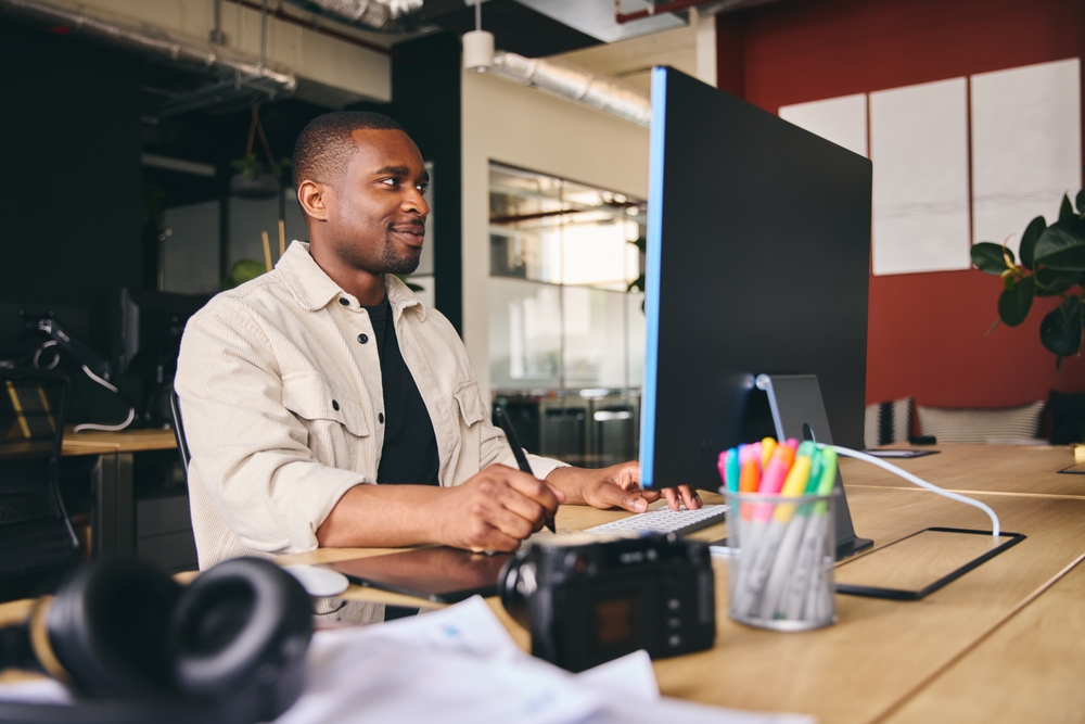 Photographer working on his computer