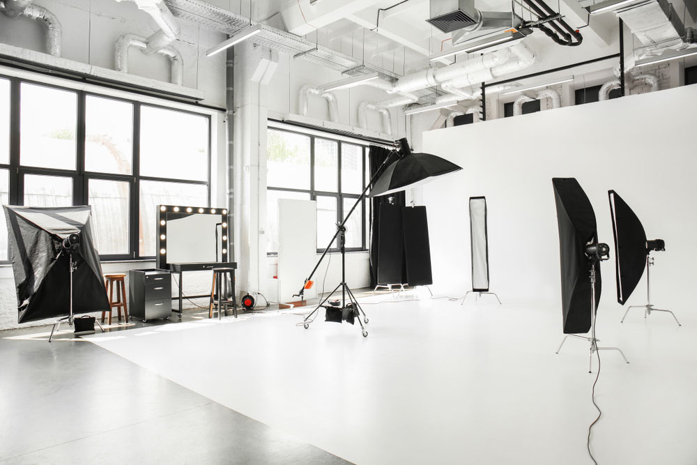 Interior of modern photo studio with professional equipment